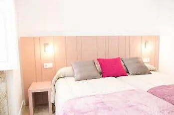 Linares * Santiago de Compostela